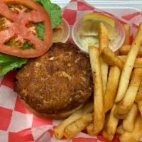 Crab Cake Sandwich · Lump crab cake on toasted brioche with lettuce tomato and remoulade sauce.