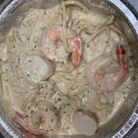 Shrimp and Scallop Alfredo · Linguine tossed in a rich creamy Parmesan sauce with jumbo shrimp and scallops.