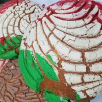 Conchas · Mexican sweet bread. Colors Vary daily