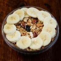 Banana Crunch Bowl · Base of acai, banana, blueberry, and almond milk, topped with sliced banana and maple granola.