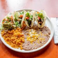 A11. Tacos de Carne Asada · Street style tacos Mexicanos. We take 3 soft corn tortillas and fill them with chopped carne...