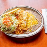 13. Enchilada, Taco and Tostada Combo · Cheese, bean, ground beef, chicken or picadillo.