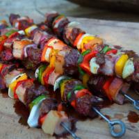 Brochette Beef (Beef Sticks) · Beef on a stick. 4 sticks with rice or fries.