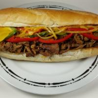 7A. Philly Cheese Steak Sandwich · Sliced steak with sauteed onions, green and red peppers and melted cheese.