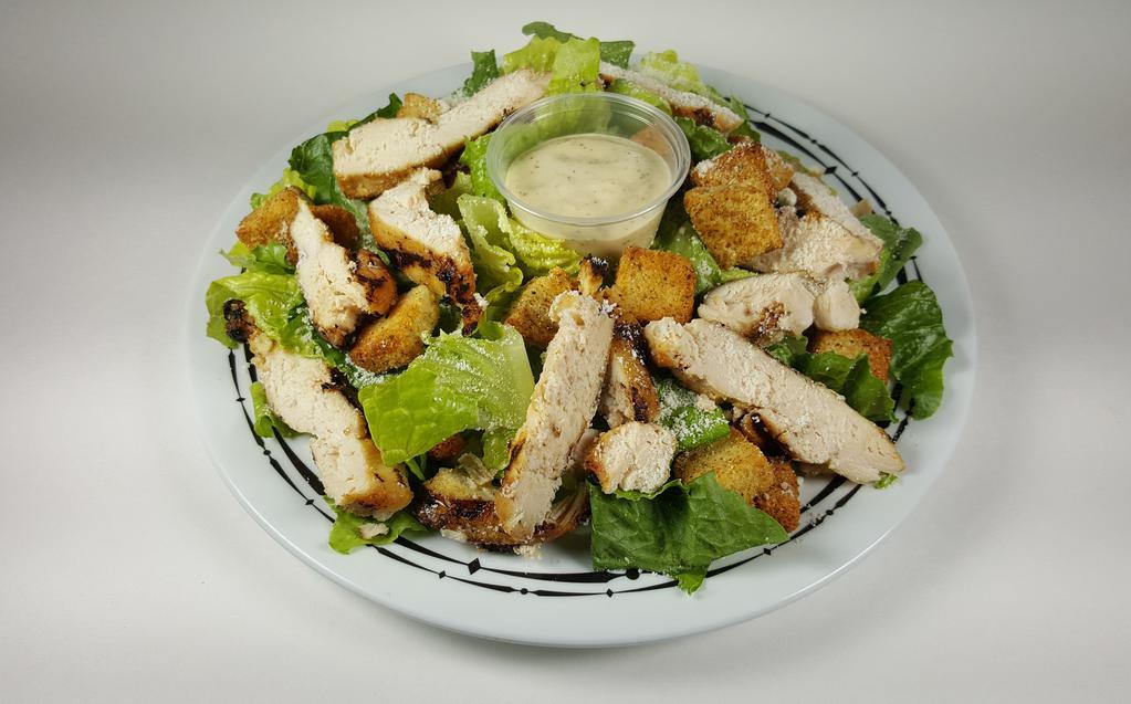 Grilled Chicken Salad · Grilled chicken breast served over freshly made Caesar salad or Tossed salad.
