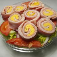 Chef Salad · A garden salad served with rolled Boars Head Ham, Roast Beef, Turkey, and American Cheese