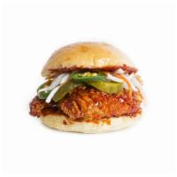 Spicy Chicken Sandwich · Crispy tender, pickle, jalapeno, green leaf, tomato, red onion with kuku spicy sweet & spicy...