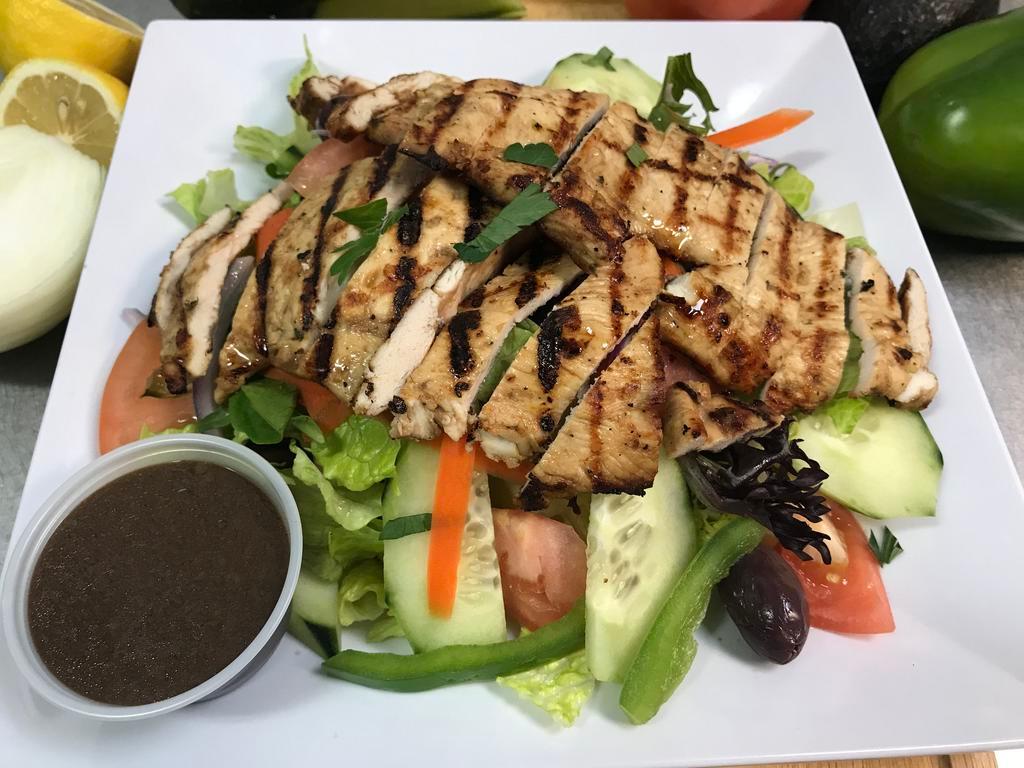 Chicken Salad · Grilled or crispy chicken breast,  lettuce, tomatoes, red onions, green peppers, mesclun, cucumber and Kalamata olives.