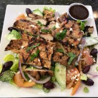 Chicken Greek Salad · Grilled or crispy chicken, lettuce, mesclun, tomatoes, red onions, cucumbers, Kalamata olive...
