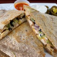 Grilled Chicken Quesadilla  · Whole wheat tortilla,grilled chicken,black beans,sour cream,lettuce 