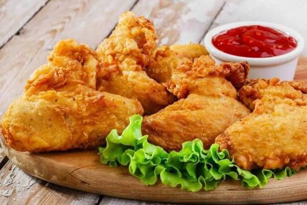 Fried Chicken Wings · 5 pieces. Cooked wing of a chicken coated in sauce or seasoning.