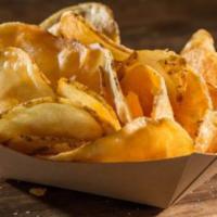 House-Made Chips · Everything tastes better when made with love, and our potato chips are no exception. Perfect...