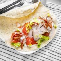 Turkey Club Wrap · Roasted turkey, crispy bacon, lettuce, tomato and mayo.