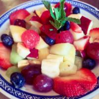 Fruit Salad · Served with seasonal fresh fruits and fresh mint.