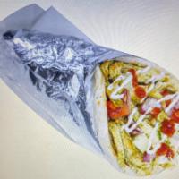 2. Chicken Shawarma Wrap · Chicken shawarma, pita bread, lettuce, cucumber, tomatoes, red onion, white sauce, and hot s...