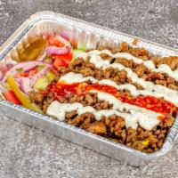 5. Gyro Plate · Gyro, rice, lettuce, cucumber, tomatoes, red onion, pickle, white sauce, and hot sauce.