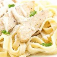 Fettuccini con Pollo · Fettuccini with chicken. Served with red or white sauce or Alfredo sauce.