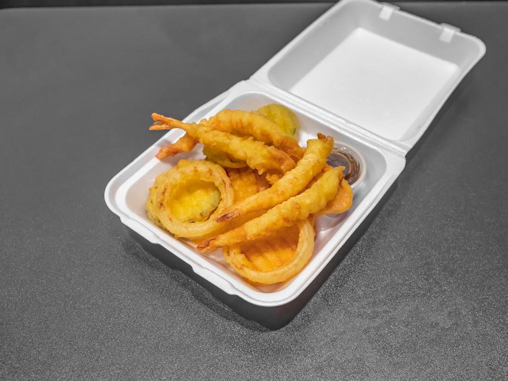 Shrimp Tempura · Traditional Japanese style battered fried shrimp served with our home-made tempura sauce.