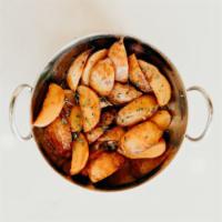 Lemon Potatoes · Lightly fried baby potatoes tossed with our lemon, herb and veggie broth.  Quite unique and ...