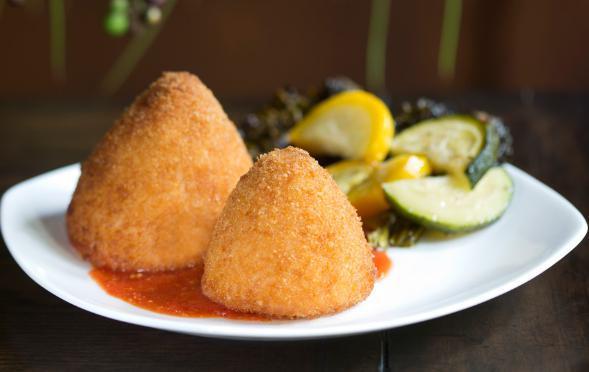 Gluten Free Classico Arancini · Fully cooked. Arborio rice filled with ground beef, peas, marinara and mozzarella, then coated in crunchy gluten free bread crumbs. Choose a size to see a price.