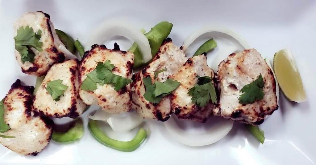 Malai Kabab · Earthen oven grilled chicken with cumin, coriander and creamy coating.