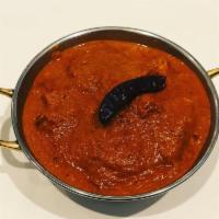 Lamb Vindaloo  · Fiery dried Kashmiri red chili blend and potato. Server with Basmati rice. Very Spicy.