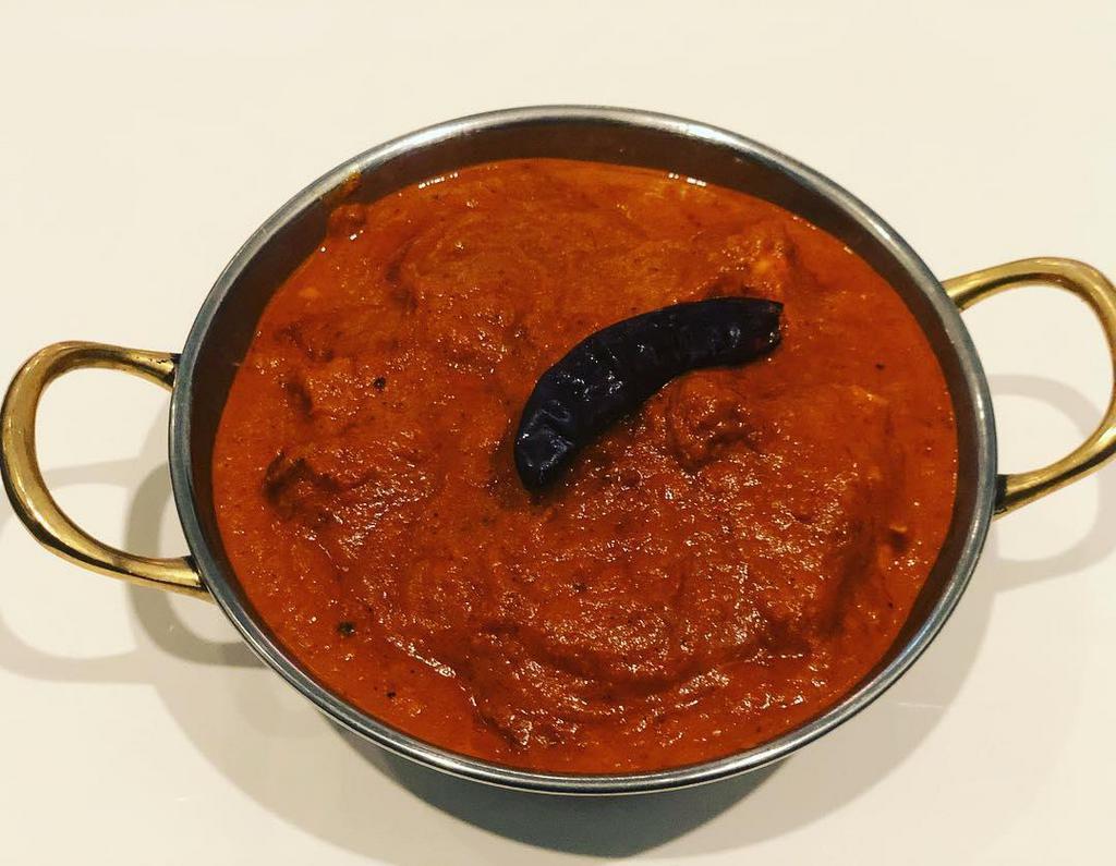 Lamb Vindaloo  · Fiery dried Kashmiri red chili blend and potato. Server with Basmati rice. Very Spicy.