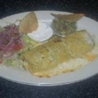Burritos de Carnitas and Bistec · Burritos steak or chicken with rice, beans and mole poblano sauce with side salad.
