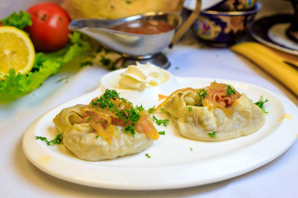 Manti · Steamed Uzbek Dumplings filled with choice of lamb and beef or pumpkin.
Served with a side of sour cream and caramelized onions.