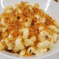 Smoked Gouda Mac N Cheese · Cavatappi pasta, smothered in a smoked Gouda & white cheddar cheese sauce then topped with s...