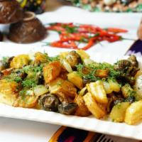 Roasted Potatoes and Mushrooms · Roasted Russet potatoes, Baby Portobello mushrooms and onions, garnished with fresh dill and...