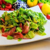Garden  · Romaine lettuce, tomatoes, cucumbers, green peppers, and onions, dressed with oil and vinegar