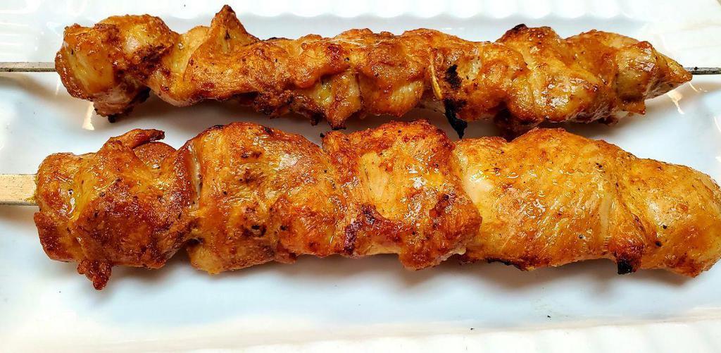 Chicken  · Five marinated flats roasted over an open flame   