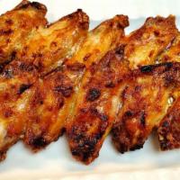 Chicken Wings · Five marinated flats roasted over an open flame   