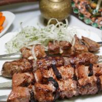 Veal Liver · Supple Veal liver layered domestic lamb fat marinated, and seasoned  