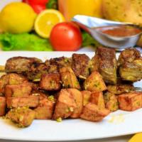Assorted Shish Kebab · Lamb ribs, Chicken and Lyula kebab, served with a side of Home-style fried potatoes 