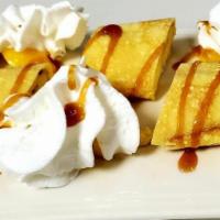 Mango Crepes · Sweet crepe filled with fresh Mango, banana slices, and house made Magic Mango whipped cream...
