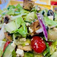 The Greek Salad · Romaine lettuce, cherry tomatoes, cucumber, peppers, red onion, feta cheese and olives with ...