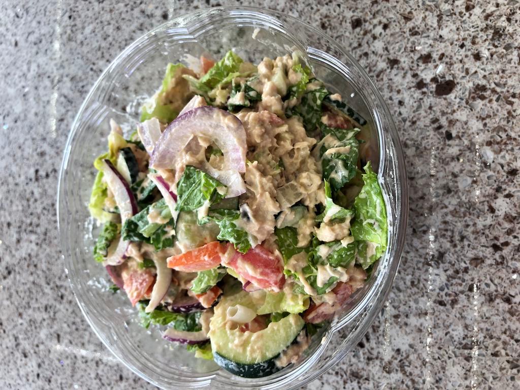 Tuna Salad · Mixed greens, cherry tomatoes, onions, cucumber, carrots and tuna salad.