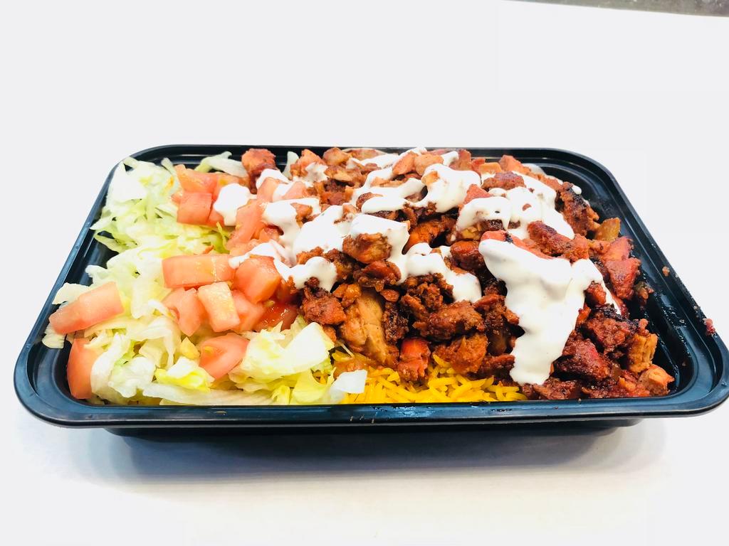 Chicken Over Rice · Served lettuce, tomato, onions and gyro sauce.