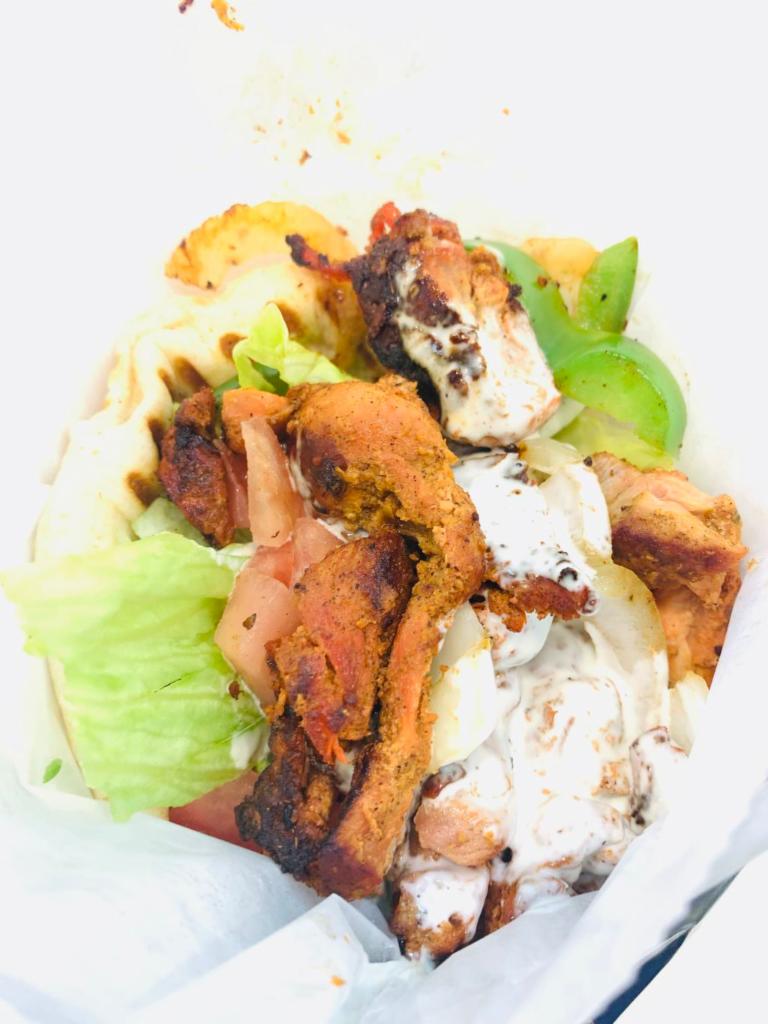 Chicken Gyro · fresh marinated chicken with organic herbs & spices lettuce, tomatoes onions white sauce