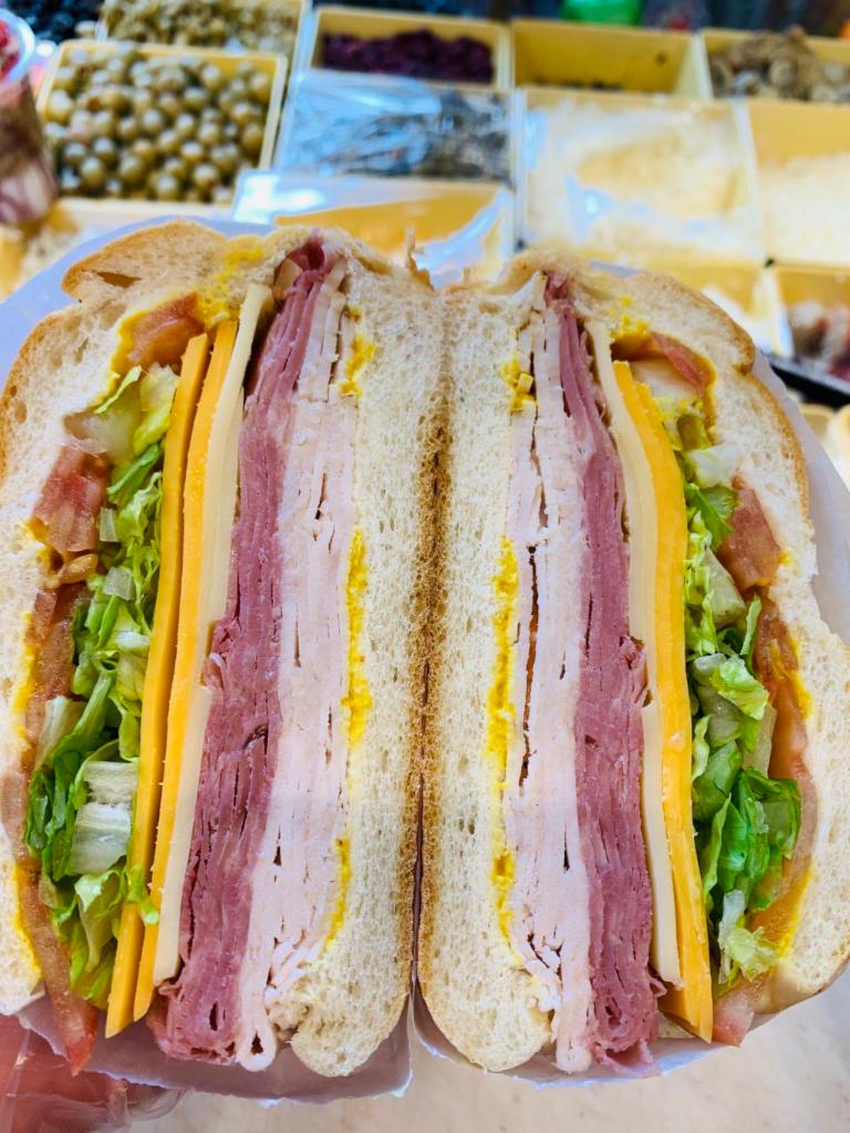Monte Cristo Sandwich · Turkey ham, turkey, Swiss, cheddar, lettuce, tomato and mustard. Or mayo
