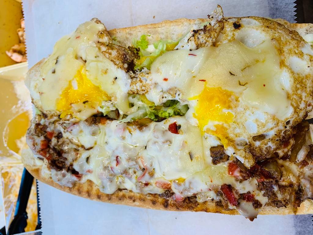 Texas Steak · Onions, peppers, pepper jack cheese and fried egg.