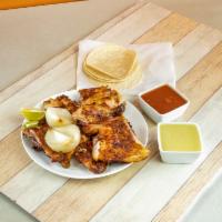 1. Whole Chicken · Tortillas, grilled onions, limes and salsas.