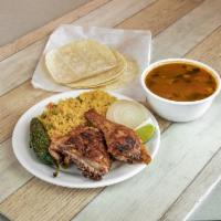 5. Especialito Regio · 2 pieces of chicken, charro beans, rice, grilled onions and tortillas.
