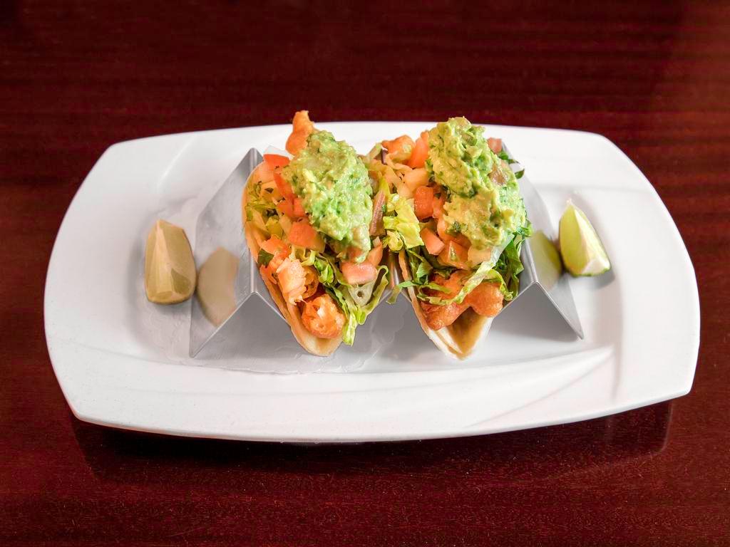 Baja Style Fish Tacos · Corn tortilla, chipotle aioli, lettuce, pico de gallo and guacamole.