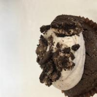 Cookies and Cream · Chocolate cupcake frosted with cookies and cream buttercream dipped in crushed chocolate coo...