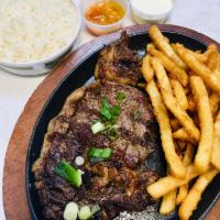 Argentine Ribeye Steak · Served with Rice, Beans, or Fries (your choice of 2)