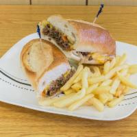 Cheese Steak Sandwich · Thin sliced beef, american cheese, peppers, onions, on a sandwich sub