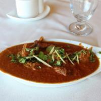 Goat Rogan Josh · A healthy Kashmir goat stew slowly cooked with Indian warm spices.